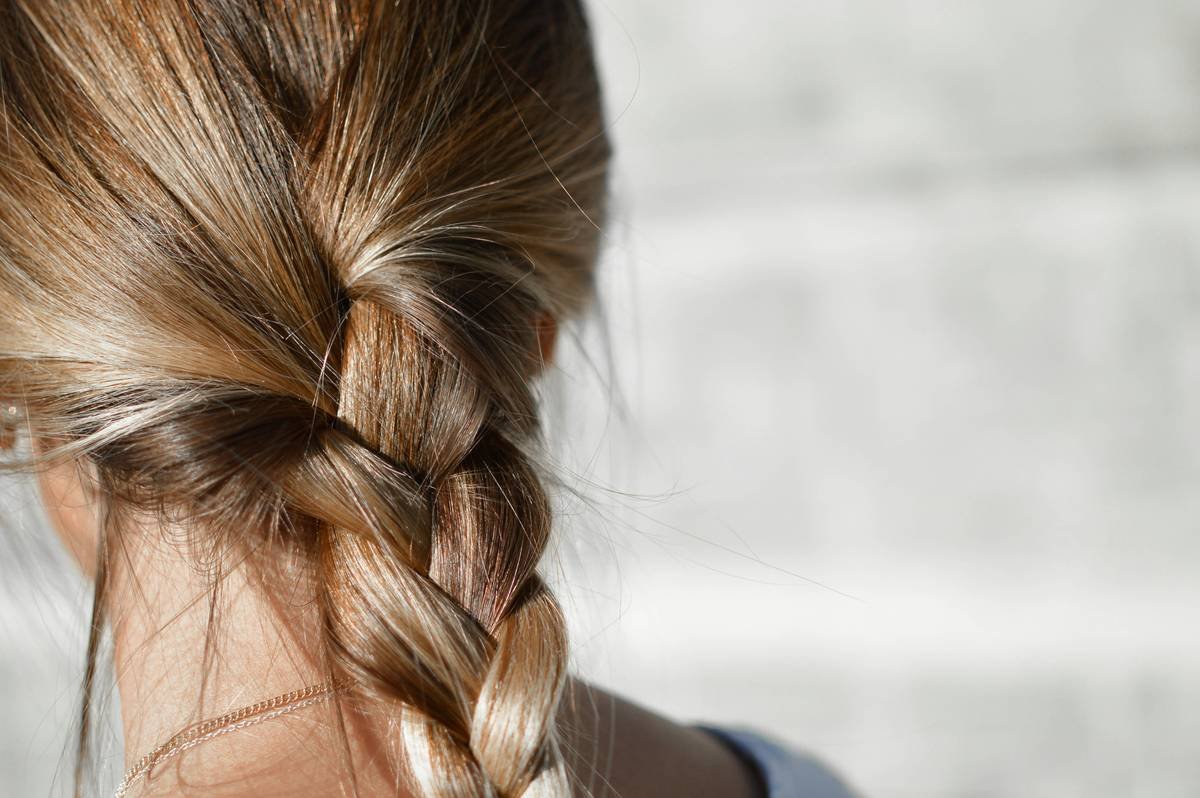 Close-up of classic bun updos showing secure U-pin placement
