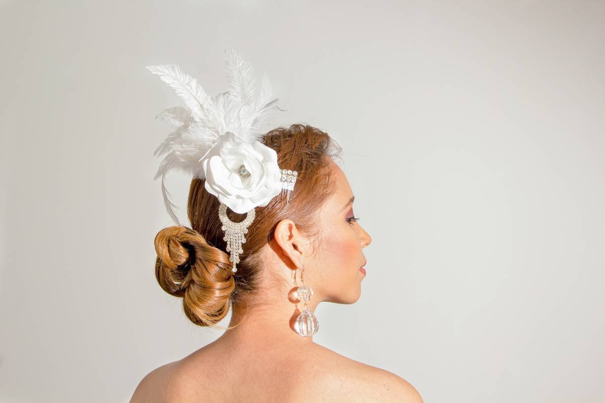 Comparison of twisted bun hairstyles showing secure anchor vs loose tuck